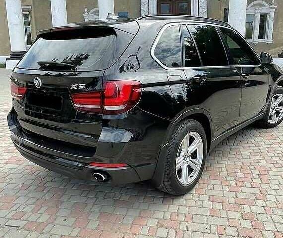 Чорний БМВ Х5, об'ємом двигуна 2 л та пробігом 145 тис. км за 21000 $, фото 4 на Automoto.ua