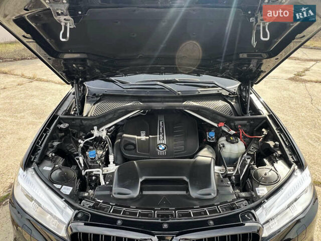 Черный БМВ Х5, объемом двигателя 3 л и пробегом 73 тыс. км за 43000 $, фото 26 на Automoto.ua