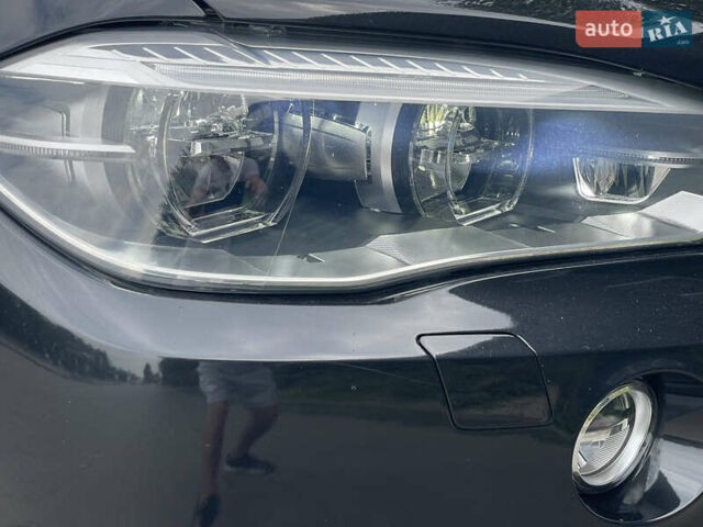 Черный БМВ Х5, объемом двигателя 3 л и пробегом 126 тыс. км за 32000 $, фото 15 на Automoto.ua