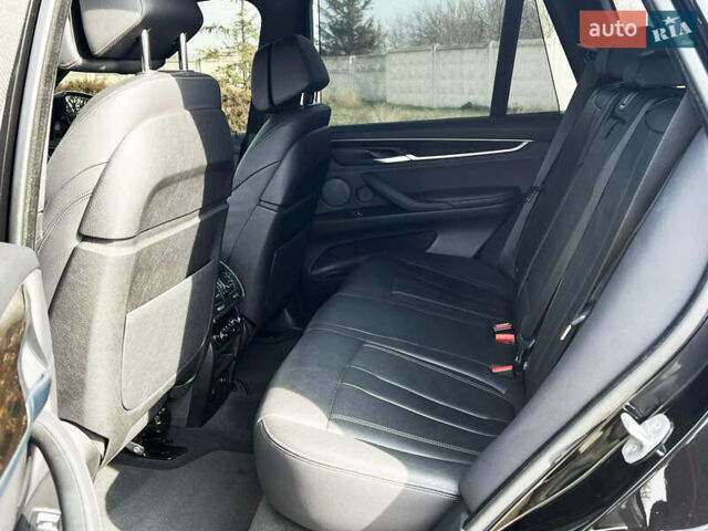 Черный БМВ Х5, объемом двигателя 3 л и пробегом 73 тыс. км за 43000 $, фото 14 на Automoto.ua