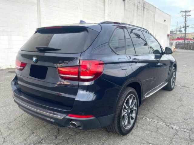 Чорний БМВ Х5, об'ємом двигуна 3 л та пробігом 58 тис. км за 21600 $, фото 7 на Automoto.ua