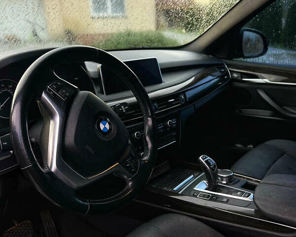 Черный БМВ Х5, объемом двигателя 3 л и пробегом 164 тыс. км за 29151 $, фото 1 на Automoto.ua