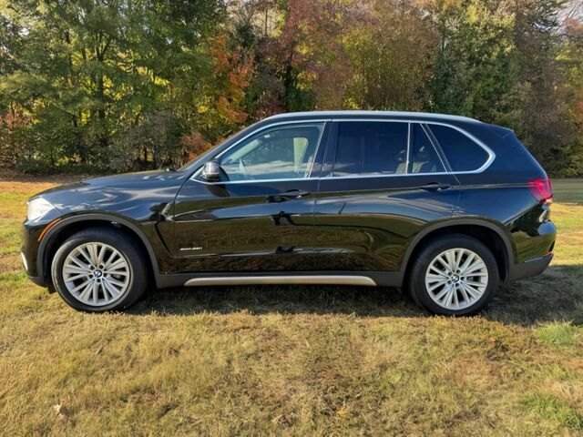 Чорний БМВ Х5, об'ємом двигуна 3 л та пробігом 64 тис. км за 17000 $, фото 3 на Automoto.ua