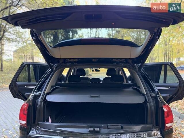 Чорний БМВ Х5, об'ємом двигуна 2 л та пробігом 130 тис. км за 28500 $, фото 94 на Automoto.ua