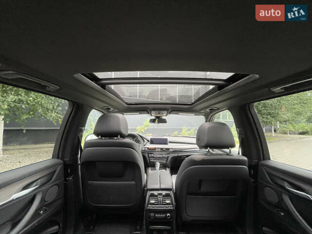 Черный БМВ Х5, объемом двигателя 3 л и пробегом 126 тыс. км за 32000 $, фото 26 на Automoto.ua