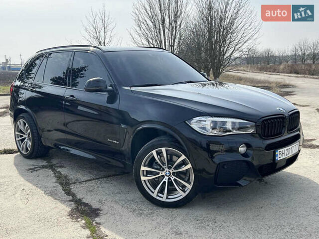 Черный БМВ Х5, объемом двигателя 3 л и пробегом 73 тыс. км за 43000 $, фото 3 на Automoto.ua
