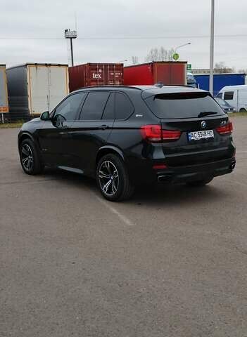 Чорний БМВ Х5, об'ємом двигуна 2 л та пробігом 200 тис. км за 26500 $, фото 4 на Automoto.ua
