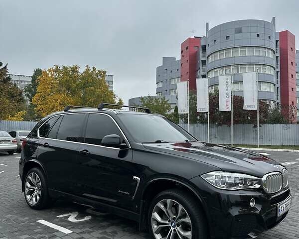 Черный БМВ Х5, объемом двигателя 2 л и пробегом 107 тыс. км за 33000 $, фото 2 на Automoto.ua
