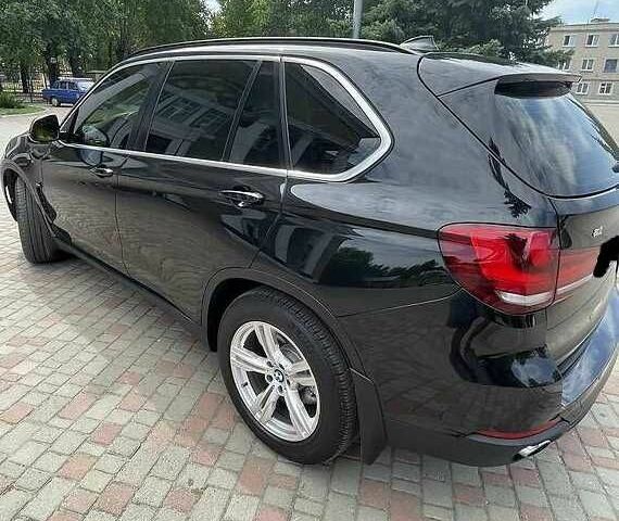 Чорний БМВ Х5, об'ємом двигуна 2 л та пробігом 145 тис. км за 21000 $, фото 2 на Automoto.ua