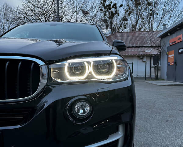 Чорний БМВ Х5, об'ємом двигуна 2 л та пробігом 67 тис. км за 39000 $, фото 2 на Automoto.ua