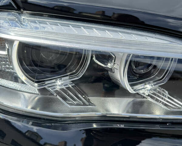 Черный БМВ Х5, объемом двигателя 2 л и пробегом 54 тыс. км за 39300 $, фото 1 на Automoto.ua