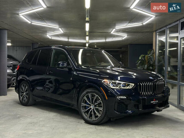 Черный БМВ Х5, объемом двигателя 3 л и пробегом 52 тыс. км за 54900 $, фото 1 на Automoto.ua