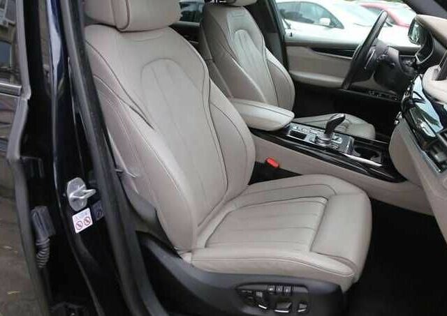 Чорний БМВ Х5, об'ємом двигуна 3 л та пробігом 117 тис. км за 25000 $, фото 14 на Automoto.ua