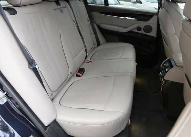 Чорний БМВ Х5, об'ємом двигуна 3 л та пробігом 117 тис. км за 25000 $, фото 16 на Automoto.ua