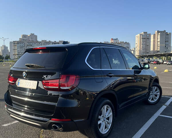 Черный БМВ Х5, объемом двигателя 2 л и пробегом 168 тыс. км за 31500 $, фото 1 на Automoto.ua