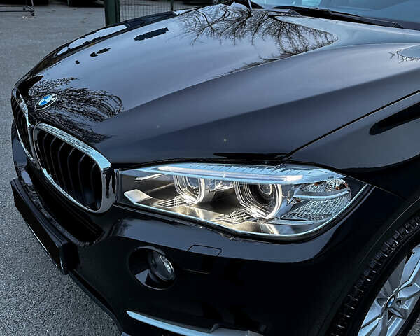 Чорний БМВ Х5, об'ємом двигуна 2 л та пробігом 67 тис. км за 39000 $, фото 3 на Automoto.ua