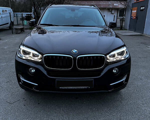 Чорний БМВ Х5, об'ємом двигуна 2 л та пробігом 67 тис. км за 39000 $, фото 1 на Automoto.ua