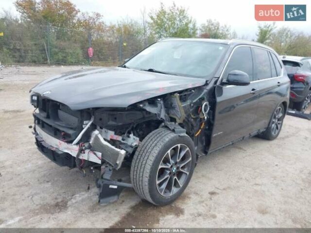 Черный БМВ Х5, объемом двигателя 2 л и пробегом 73 тыс. км за 9800 $, фото 1 на Automoto.ua