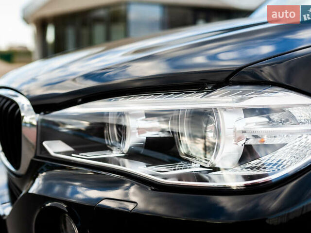 Черный БМВ Х5, объемом двигателя 2 л и пробегом 80 тыс. км за 37000 $, фото 4 на Automoto.ua