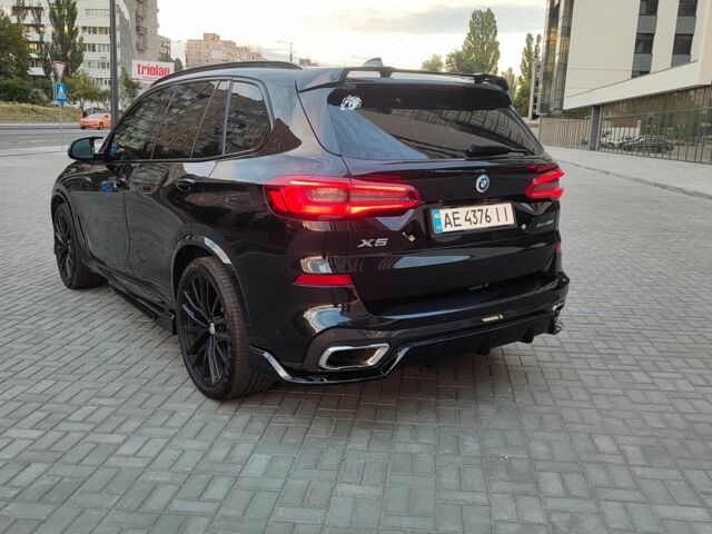 Черный БМВ Х5, объемом двигателя 3 л и пробегом 103 тыс. км за 57000 $, фото 3 на Automoto.ua