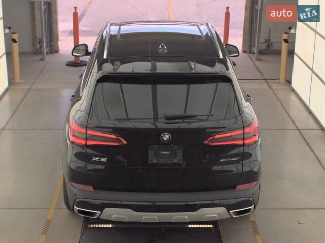 Черный БМВ Х5, объемом двигателя 3 л и пробегом 143 тыс. км за 29400 $, фото 2 на Automoto.ua