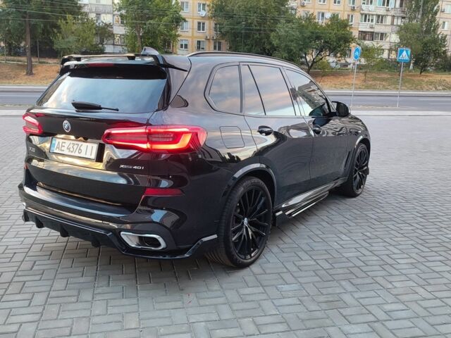 Черный БМВ Х5, объемом двигателя 3 л и пробегом 103 тыс. км за 57000 $, фото 2 на Automoto.ua