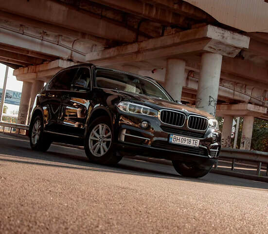 Черный БМВ Х5, объемом двигателя 2 л и пробегом 212 тыс. км за 38900 $, фото 1 на Automoto.ua