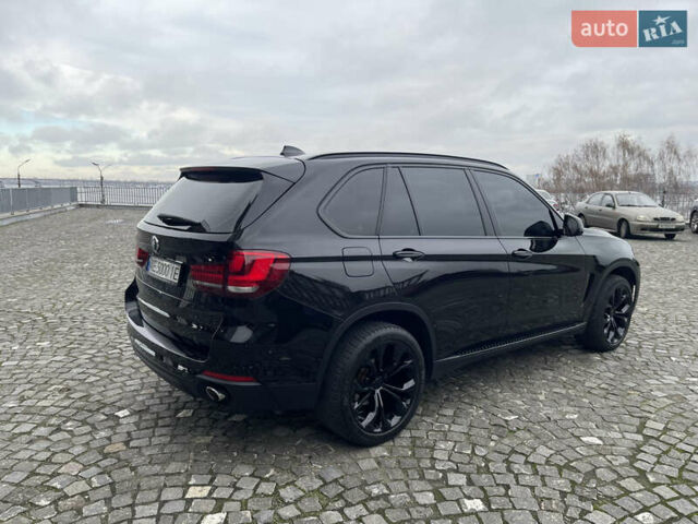 Черный БМВ Х5, объемом двигателя 2.5 л и пробегом 118 тыс. км за 34500 $, фото 3 на Automoto.ua