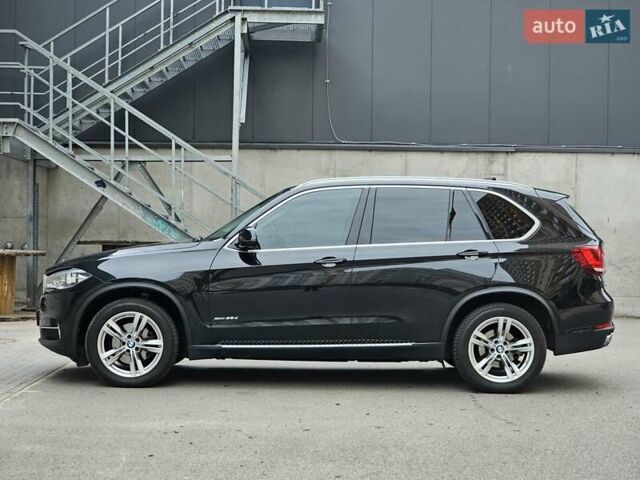 Черный БМВ Х5, объемом двигателя 2 л и пробегом 144 тыс. км за 33999 $, фото 1 на Automoto.ua