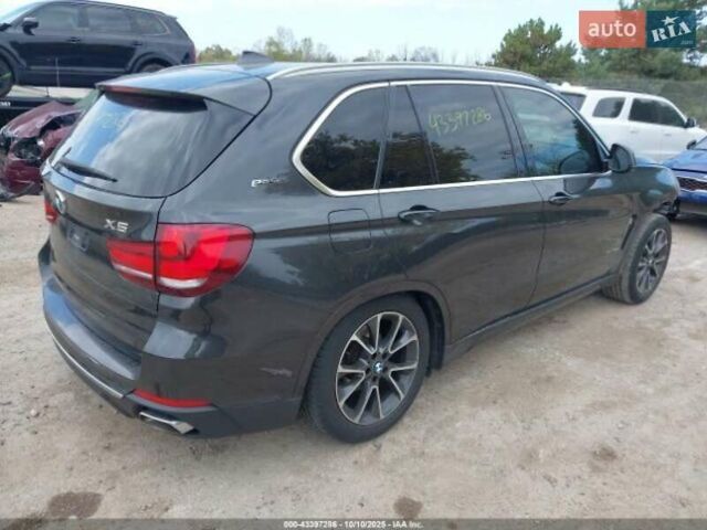 Черный БМВ Х5, объемом двигателя 2 л и пробегом 73 тыс. км за 9800 $, фото 3 на Automoto.ua