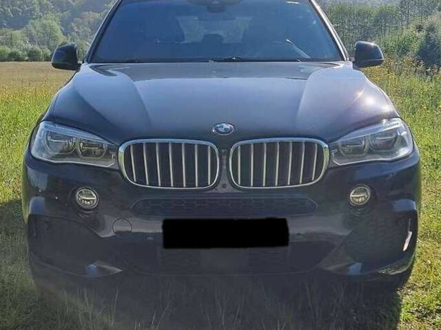 Чорний БМВ Х5, об'ємом двигуна 3 л та пробігом 117 тис. км за 25000 $, фото 1 на Automoto.ua