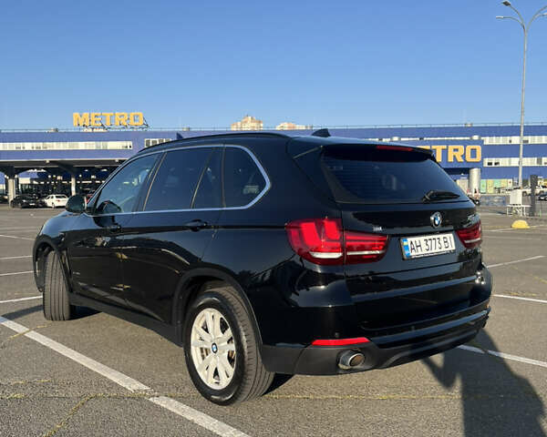 Черный БМВ Х5, объемом двигателя 2 л и пробегом 168 тыс. км за 31500 $, фото 3 на Automoto.ua