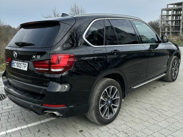 Черный БМВ Х5, объемом двигателя 2 л и пробегом 100 тыс. км за 28700 $, фото 4 на Automoto.ua