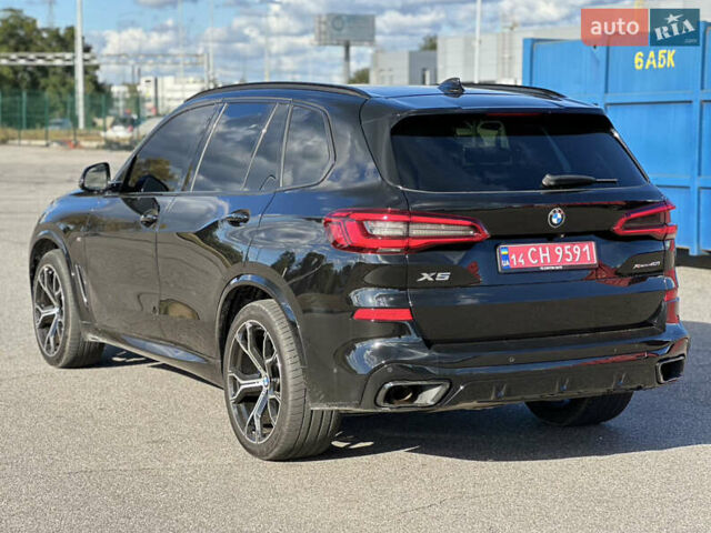 Чорний БМВ Х5, об'ємом двигуна 3 л та пробігом 150 тис. км за 45900 $, фото 1 на Automoto.ua