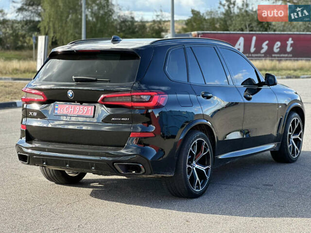 Чорний БМВ Х5, об'ємом двигуна 3 л та пробігом 150 тис. км за 45900 $, фото 2 на Automoto.ua