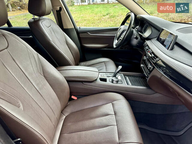 Черный БМВ Х5, объемом двигателя 2 л и пробегом 126 тыс. км за 29950 $, фото 1 на Automoto.ua