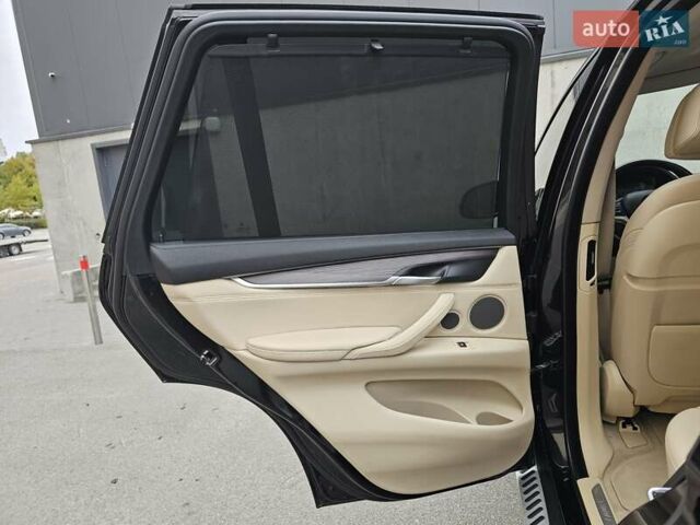 Черный БМВ Х5, объемом двигателя 2 л и пробегом 144 тыс. км за 33999 $, фото 72 на Automoto.ua