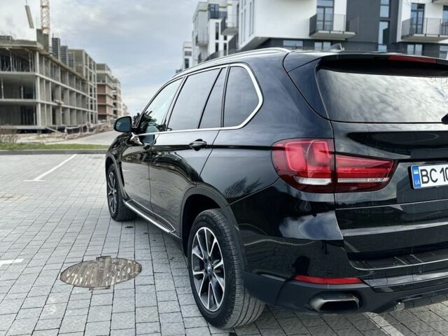 Черный БМВ Х5, объемом двигателя 2 л и пробегом 100 тыс. км за 28700 $, фото 1 на Automoto.ua