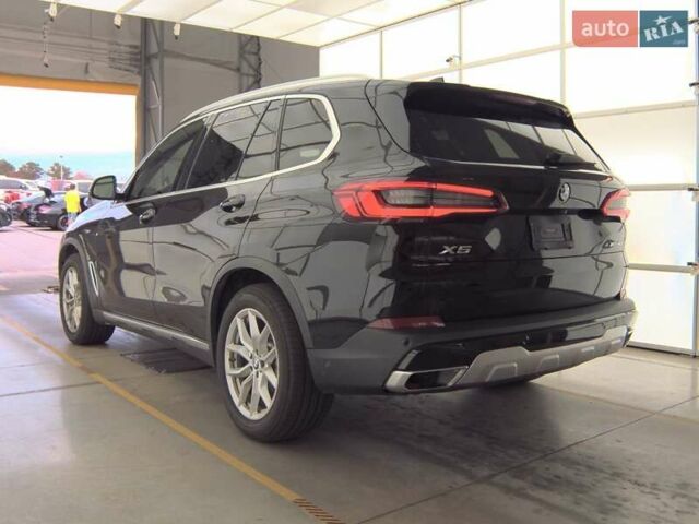 Черный БМВ Х5, объемом двигателя 3 л и пробегом 143 тыс. км за 29400 $, фото 1 на Automoto.ua