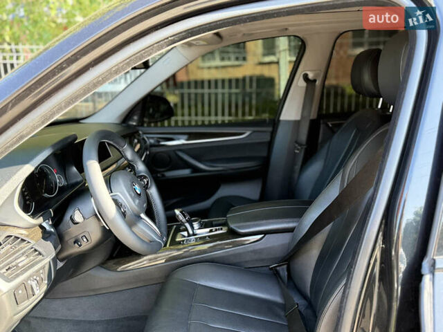 Чорний БМВ Х5, об'ємом двигуна 2.99 л та пробігом 70 тис. км за 41500 $, фото 7 на Automoto.ua