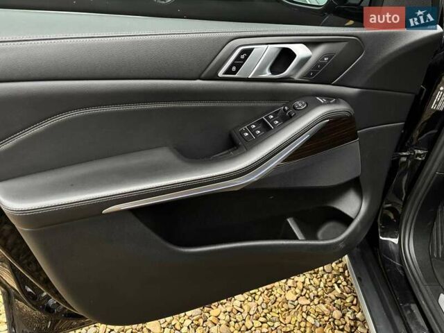 Черный БМВ Х5, объемом двигателя 3 л и пробегом 175 тыс. км за 41500 $, фото 28 на Automoto.ua