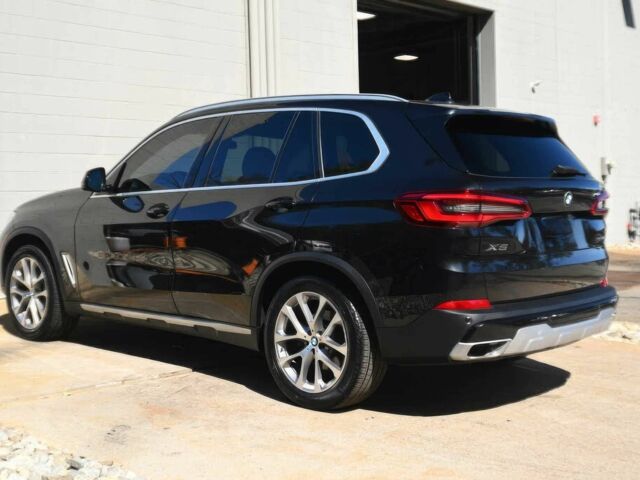 Черный БМВ Х5, объемом двигателя 3 л и пробегом 37 тыс. км за 25000 $, фото 2 на Automoto.ua