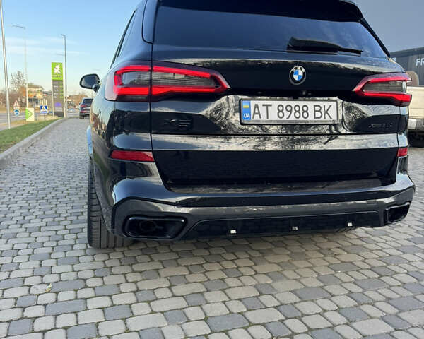 Черный БМВ Х5, объемом двигателя 3 л и пробегом 98 тыс. км за 64800 $, фото 4 на Automoto.ua