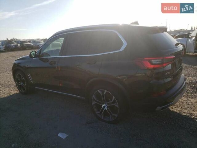 Черный БМВ Х5, объемом двигателя 3 л и пробегом 136 тыс. км за 19800 $, фото 1 на Automoto.ua