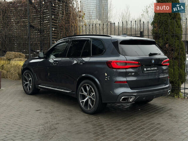 Черный БМВ Х5, объемом двигателя 3 л и пробегом 115 тыс. км за 52900 $, фото 4 на Automoto.ua