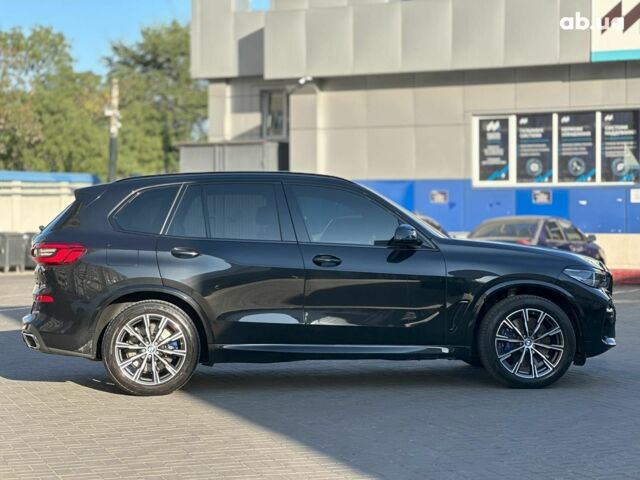 Черный БМВ Х5, объемом двигателя 3 л и пробегом 94 тыс. км за 64940 $, фото 3 на Automoto.ua