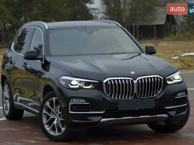 Чорний БМВ Х5, об'ємом двигуна 3 л та пробігом 63 тис. км за 18400 $, фото 2 на Automoto.ua