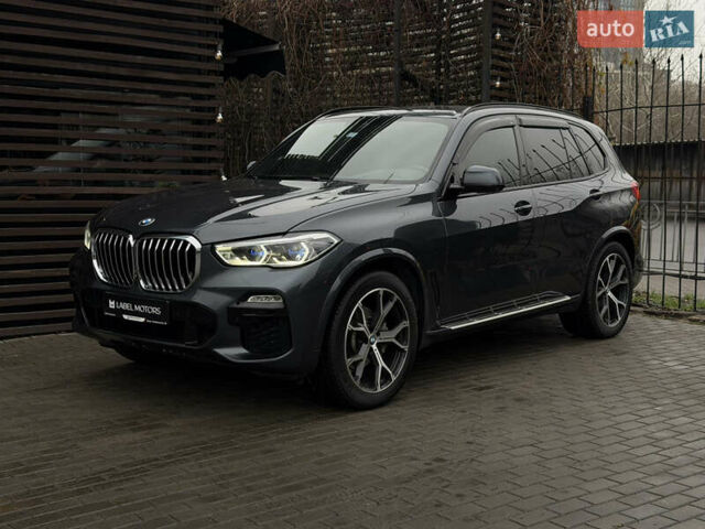 Черный БМВ Х5, объемом двигателя 3 л и пробегом 115 тыс. км за 52900 $, фото 2 на Automoto.ua