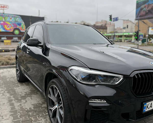 Черный БМВ Х5, объемом двигателя 3 л и пробегом 85 тыс. км за 58000 $, фото 1 на Automoto.ua