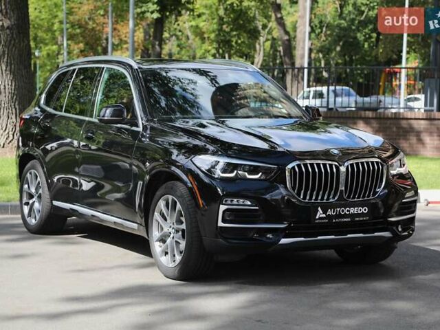 Чорний БМВ Х5, об'ємом двигуна 3 л та пробігом 100 тис. км за 52000 $, фото 2 на Automoto.ua